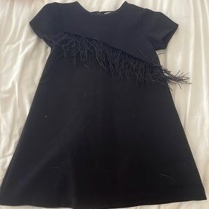 zara girls black dress. includes a feather material on the front.